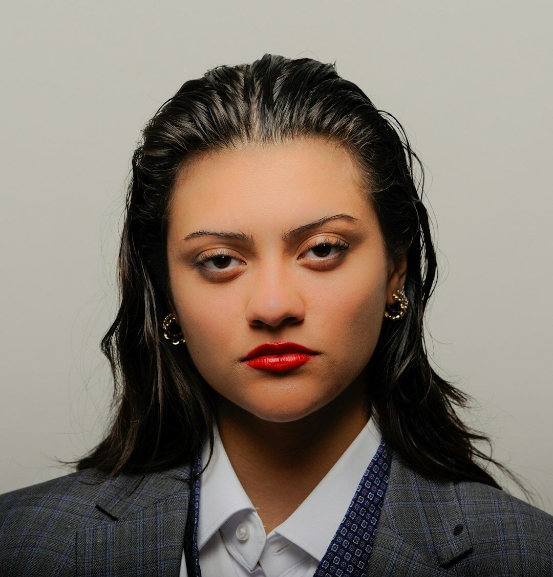 Studio portrait of a Latina woman journalist in her 30s