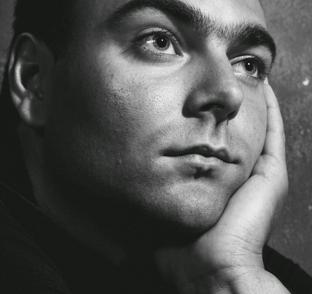 Portrait of a young Latino man musician with confident expression