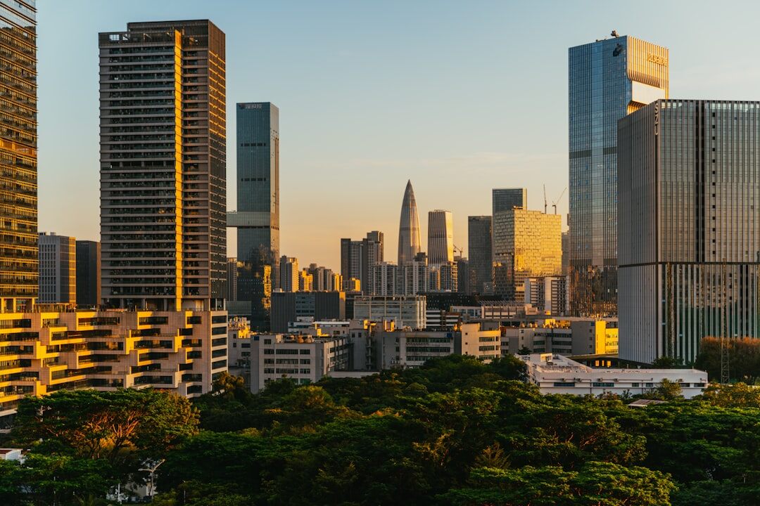 City skyline at dusk with lit buildings